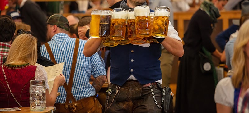 Oktoberfest, Munich, Germany. Waiter Serve Beer, Closeup View. P